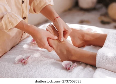 Close-up of professional foot reflexology massage